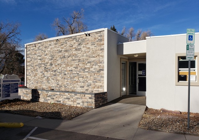 Commercial building exterior with stone facade